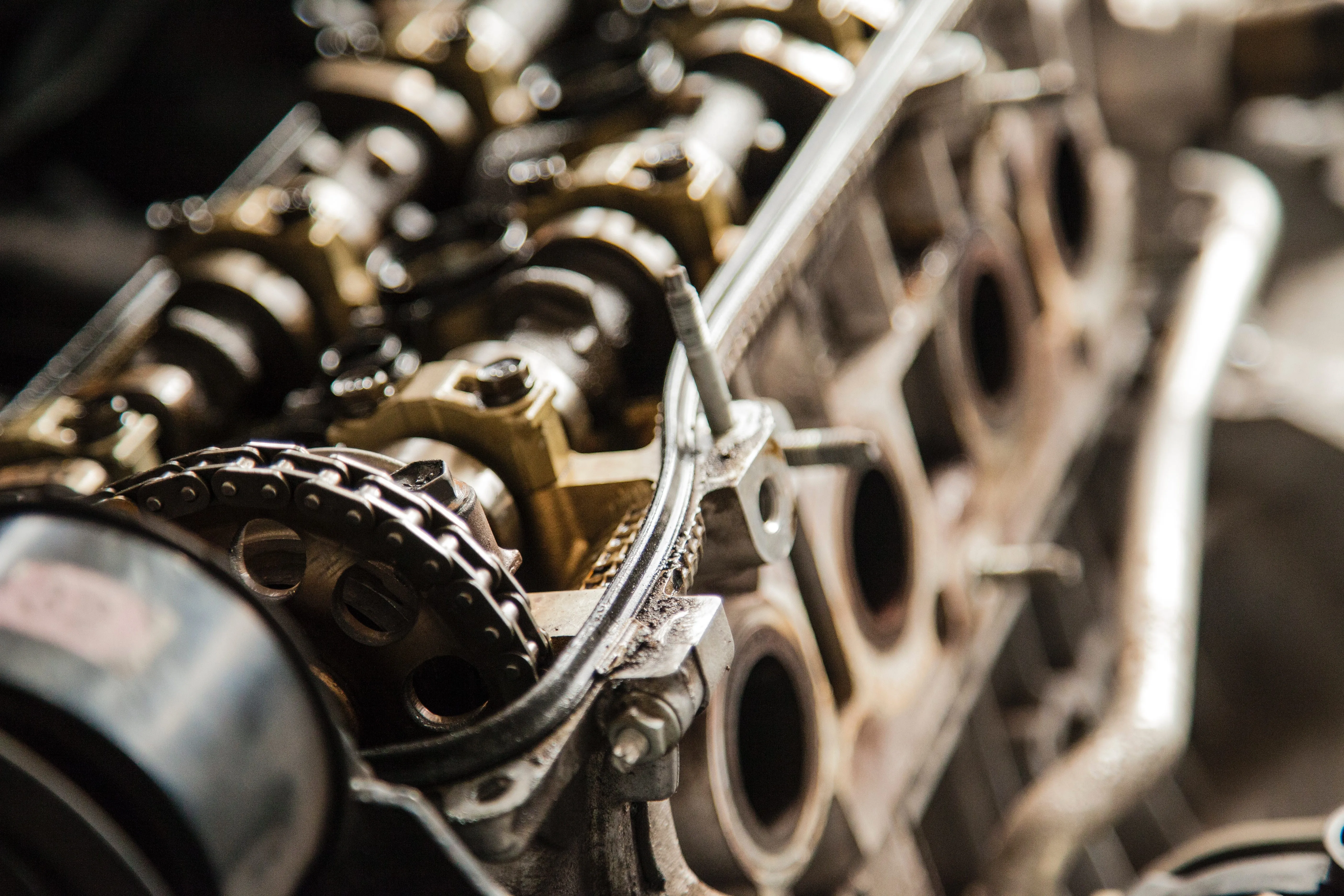 Close-up of a bicycle drivetrain being adjusted